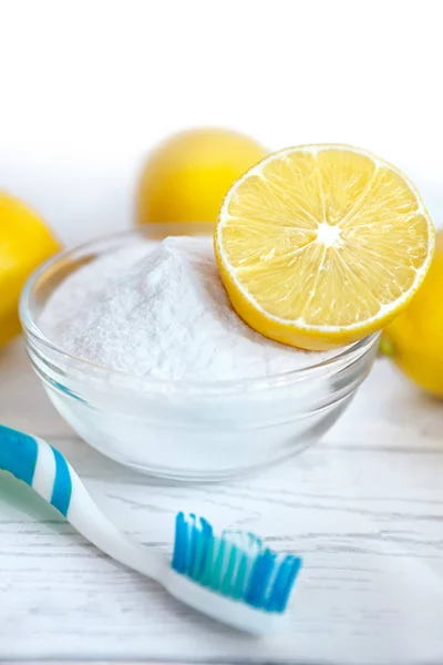 Eco cleaners baking soda, lemon, tooth brush