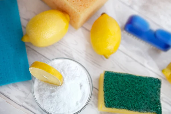 Baking soda with lemon and cleaning brush — Stock Photo, Image