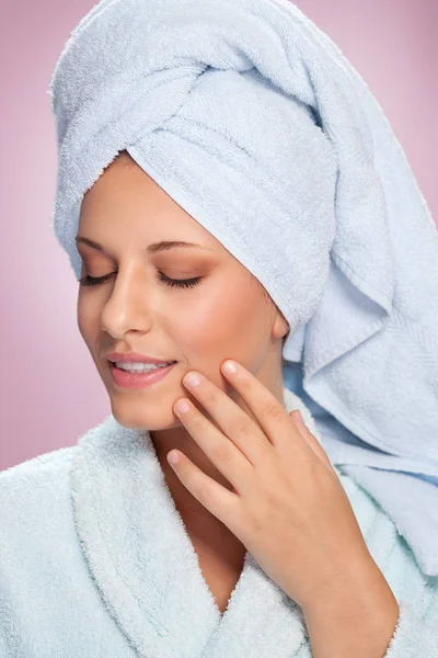 Beautiful spa woman in bathrobe posing — Stock Photo, Image