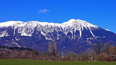 View from the Sava river valley towards the Austrian Alps (Pogled iz doline reke Save proti avstrijskim Alpam) - Radovljica, Slovenia