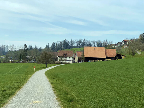 Trails for walking, sports and recreation through the pastures and settlements above Lake Zurich (Zurichsee or Zuerichsee), Erlenbach - Canton of Zurich or Zuerich, Switzerland