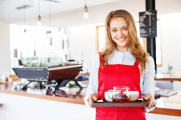 Woman waitress with tea and coffee — Stock Photo, Image