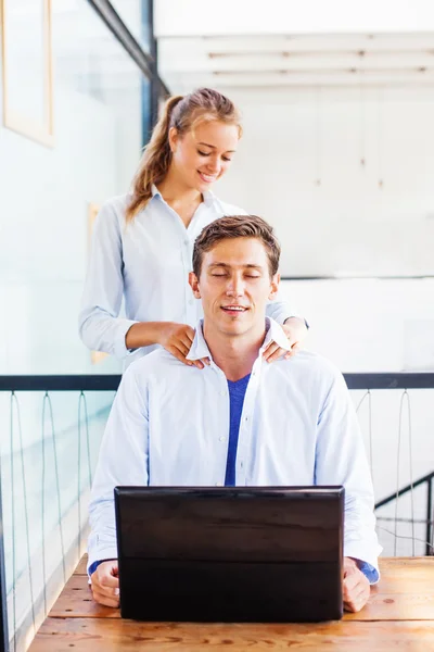 office worker getting massage from girl