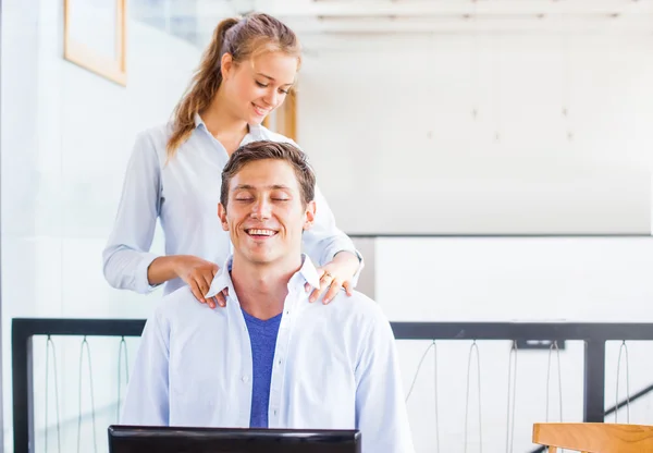 Office worker getting massage from girl — Stock Photo, Image
