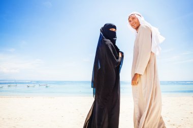 muslim couple on beach   clipart