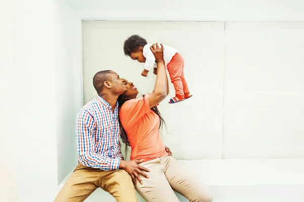 happy african family of three