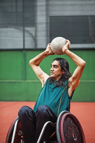 Rugby player in a wheelchair practicing — Stock Photo, Image