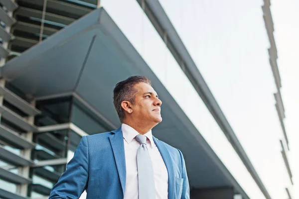 man wearing suit looking away