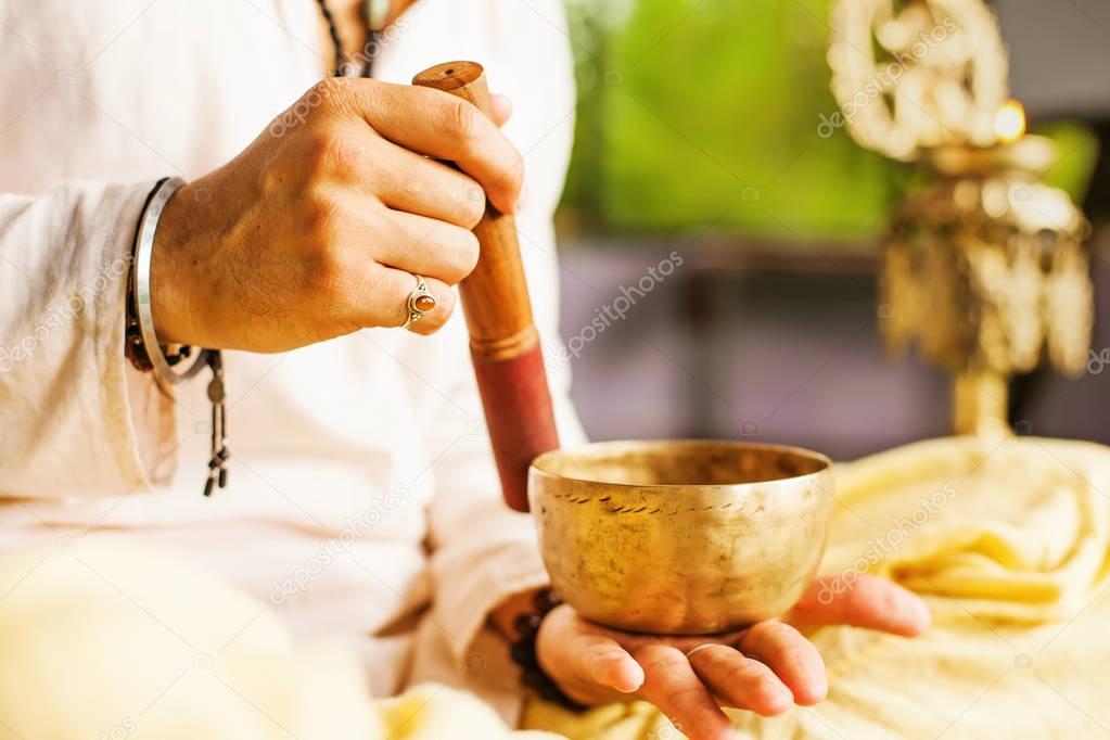 man playing mantras 