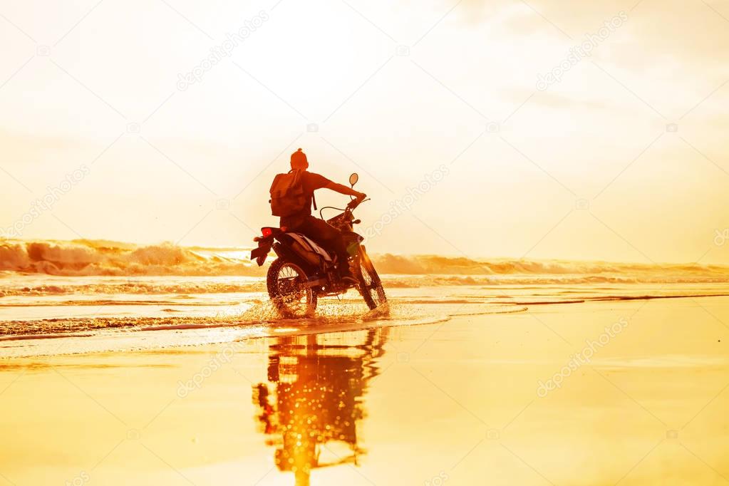 young man riding a motorbike on Bali