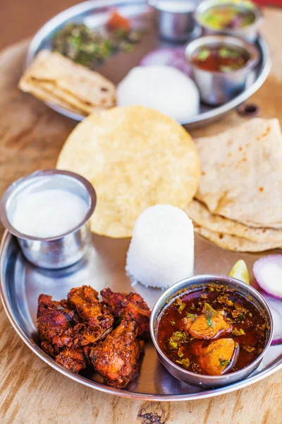 Top view of indian vegetarian and non-vegetarian food plates