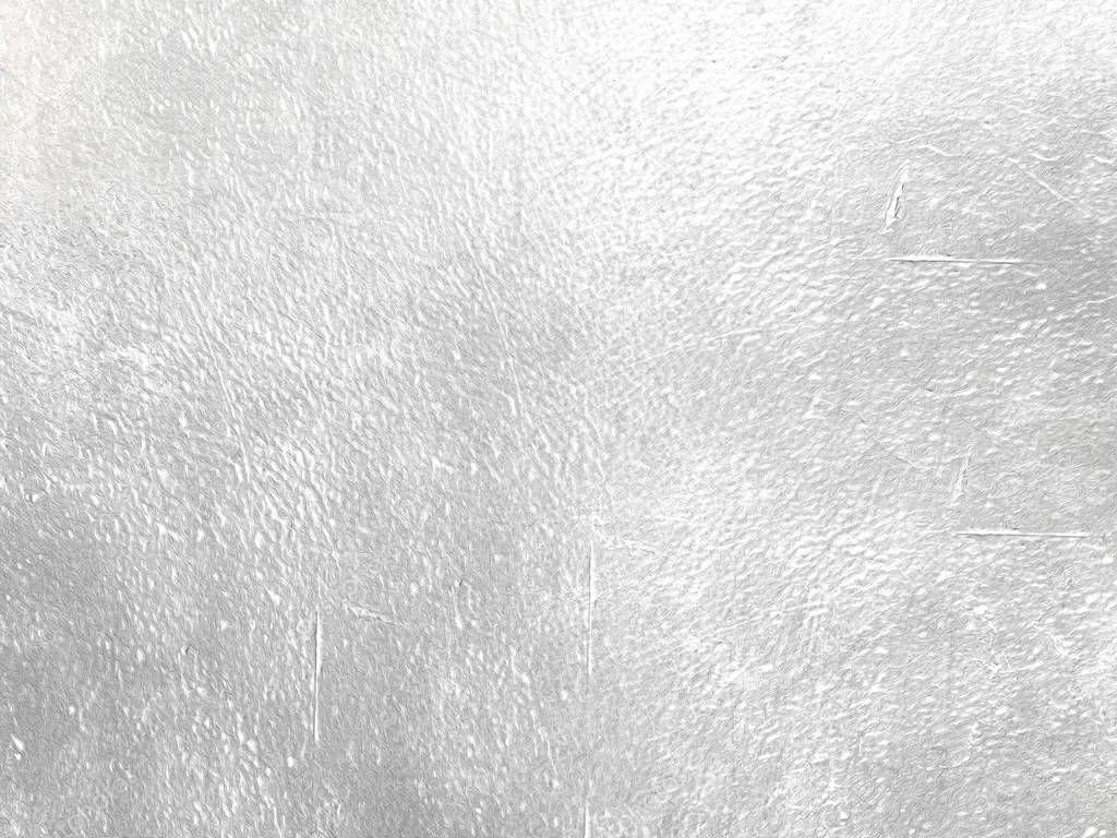 Silver foil background - abstract light grey shiny metal texture