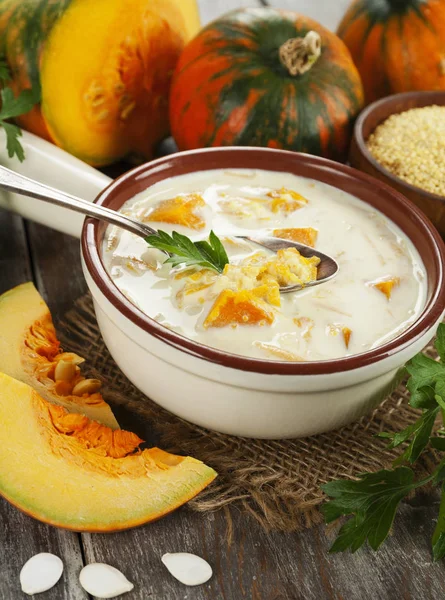 Milk soup with pumpkin and millet — Stock Photo, Image