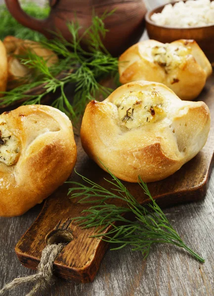 Baked buns stuffed with curd cheese — Stock Photo, Image