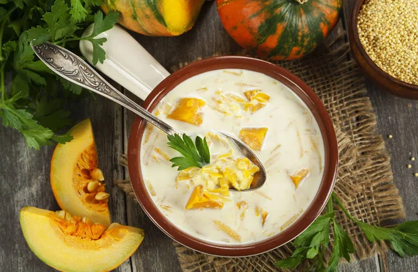 Milk soup with pumpkin and millet — Stock Photo, Image