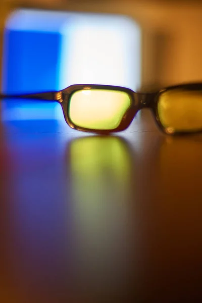 Glasses for vision are on the table — ストック写真