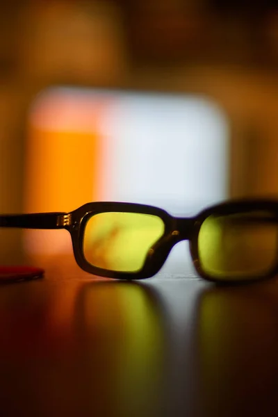 Glasses for vision are on the table — 图库照片