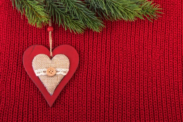 Kerstmis achtergrond in boerderij stijl. Rode wol vintage rustieke achtergrond voor Christmas celebration — Stockfoto