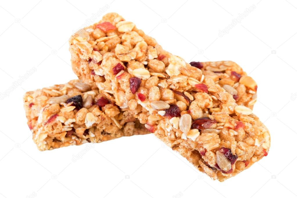Granola bars isolated on white. Granola ingredients oats, dried cranberries, nuts, sunflower seeds, honey.