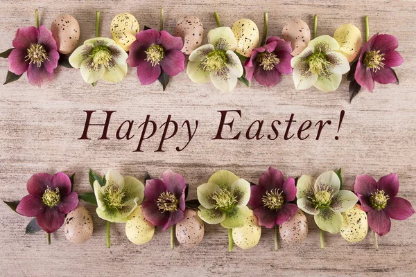 Ostern Hintergrund frohe Ostern. Frühling Blumen Anordnung auf hellbraunem rustikalem Hintergrund — Stockfoto