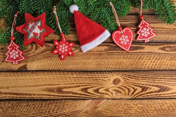Vánoční Dovolená Pozadí Santa Čepice Červená Dekorace Tmavý Dřevěný Stůl — Stock fotografie