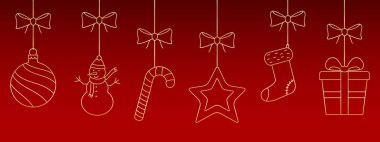 Kırmızı arka planda asılı Noel süsleri