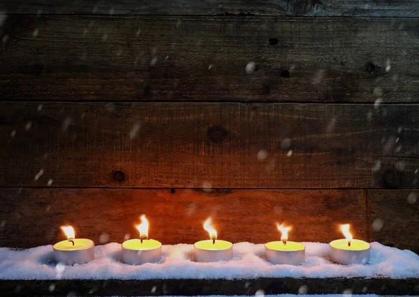 Candle Light Wooden Background Flowing Snow Christmas — Stock Photo, Image