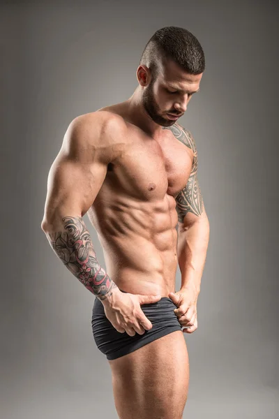 근육 질 남자-사이드 보기 — 스톡 사진