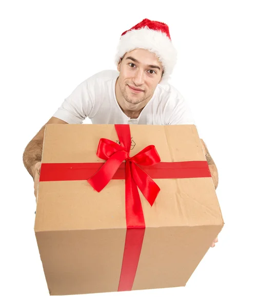 Santa man holding gift — Stockfoto