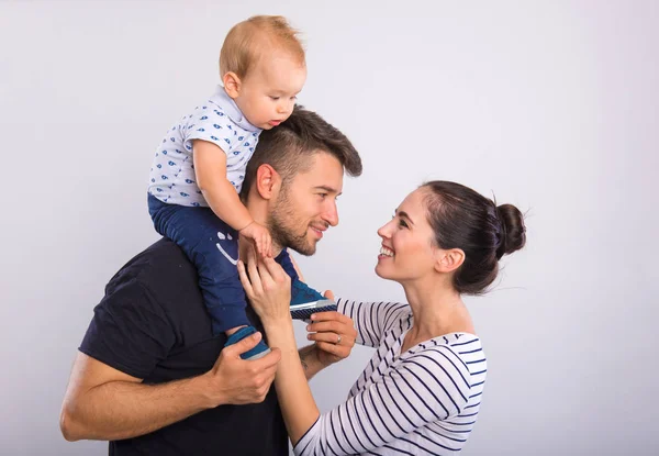 Young couple with a little boy . — Stock Photo, Image