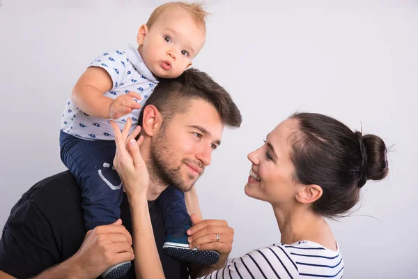 Young couple with a little boy . — Stock Photo, Image