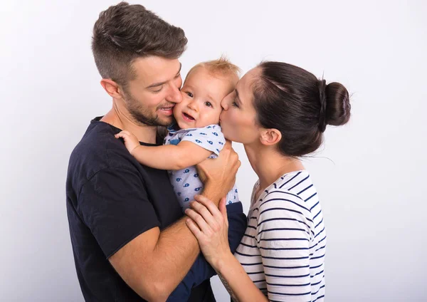 Young couple with a little boy . — Stock Photo, Image