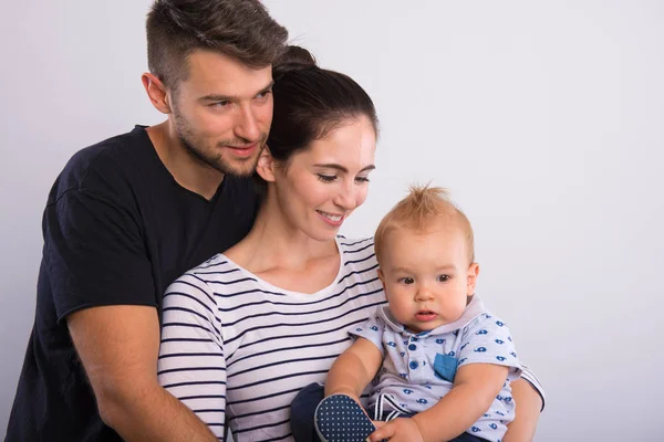 Young couple with a little boy . — Stock Photo, Image