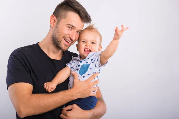 Handsome young father with little boy . — Stock Photo, Image