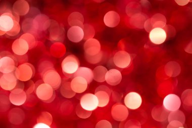 Noel ve Yeni Yıl kırmızı bulanıklaştırılmış bokeh arkaplanı