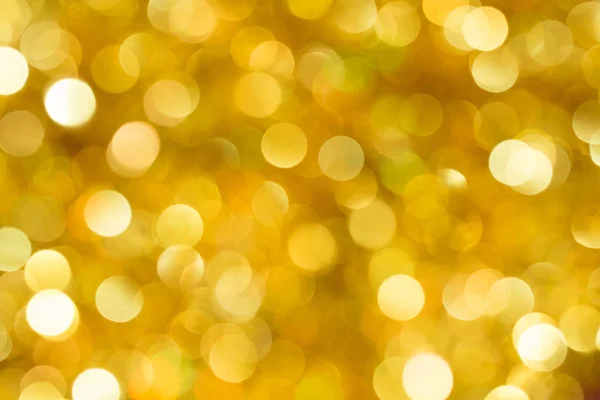 Vánoce a nový rok zlatý rozmazané pozadí rozostření bokeh — Stock fotografie