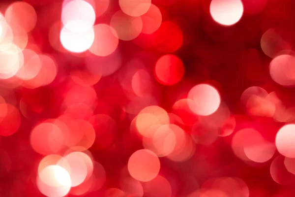 Karácsony és újév piros elmosódott disszidált bokeh háttér — Stock Fotó
