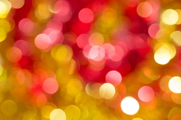Noel ve yeni yıl parlak, renkli bulanık ufuk bokeh arka plan — Stok fotoğraf
