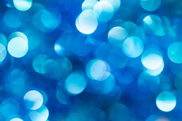 Christmas and New Year blue blurred defocused bokeh background — Stock Photo, Image