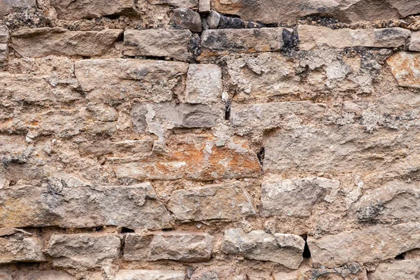 Fondo textural. Primer plano ladrillo piedra viejo envejecido marrón antiguo — Foto de Stock