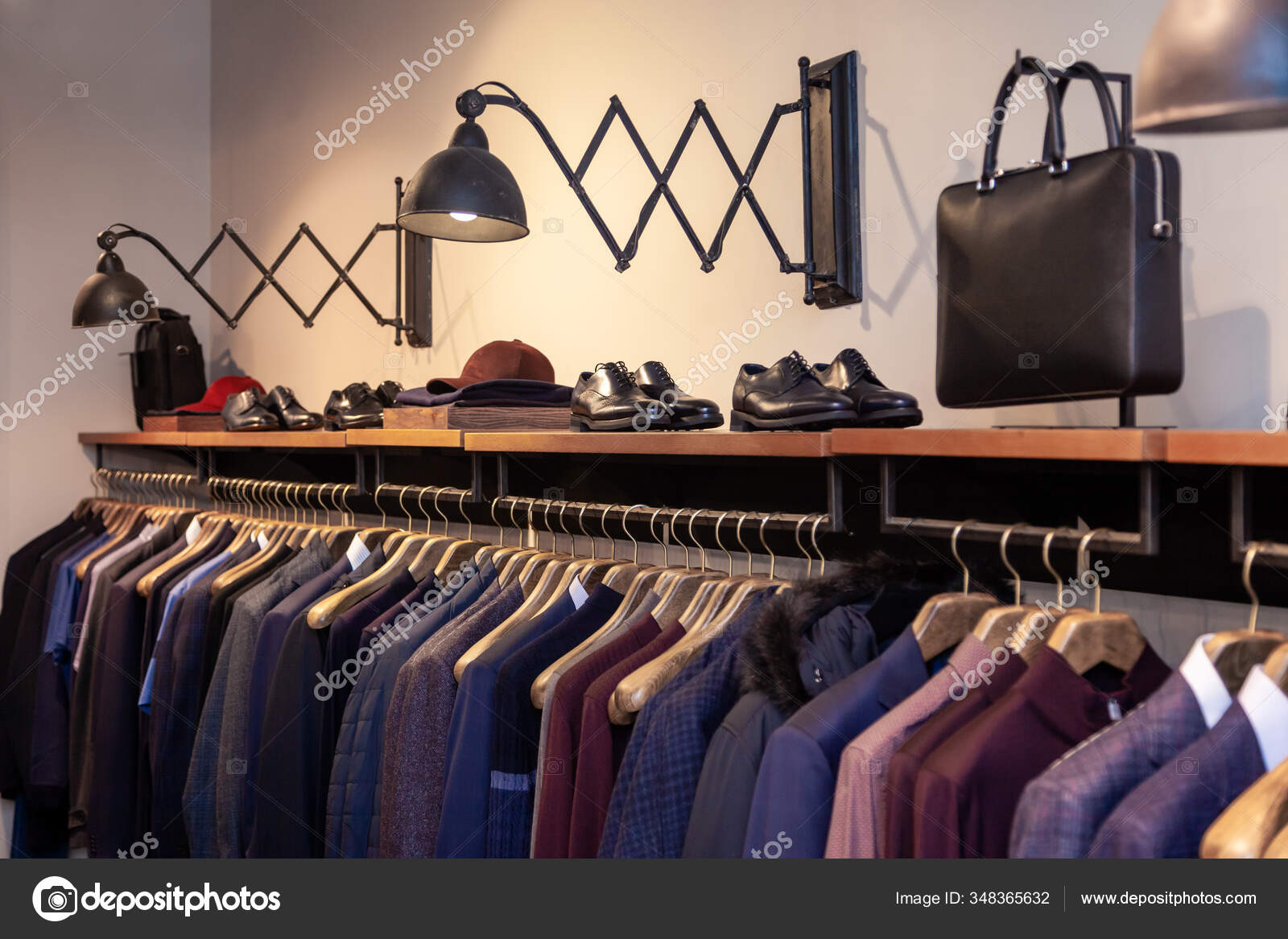 Closeup colorful male, female clothes, shoes in boutique hanging on  hangers, clothing rack. Concept opening luxury shop, shopping mall, store  sale, retail fashion store, second hand outlet. Stock Photo by ©mikrokon  348365632