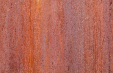 Kalıplı kırmızı paslı duvar arkaplanı, yıllanmış eski yüzey, yatay.