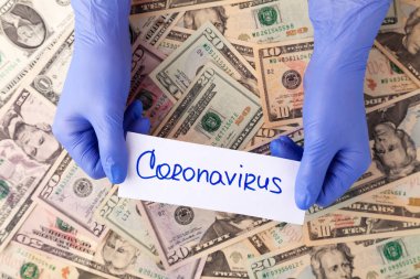 Lateks mor eldivenli eller COVID-19, ABD doları banknotlarında Coronavirus.