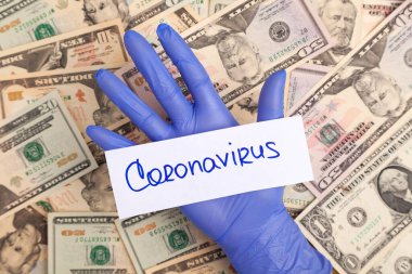 Lateks mor eldivenli eller COVID-19, ABD doları banknotlarında Coronavirus.