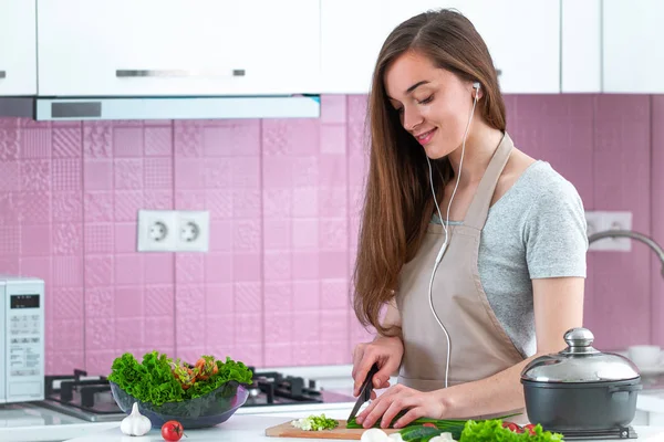 Young Housewife Headphones Apron Listening Music Enjoying Cooking Preparation Kitchen — 스톡 사진