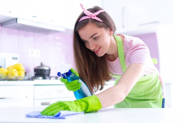 Young Attractive Housewife Protective Rubber Gloves Wiping Dust Table Kitchen — Stock Photo, Image
