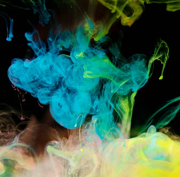 Inkousty ve vodě, barevná exploze — Stock fotografie