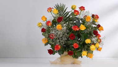 Bouquet of roses isolated on light gray background