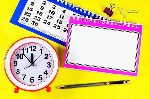 Write down the date and time in a Notepad to remember. Calendar, clock, and Notepad for planning business goals, training, recreation, and holidays.