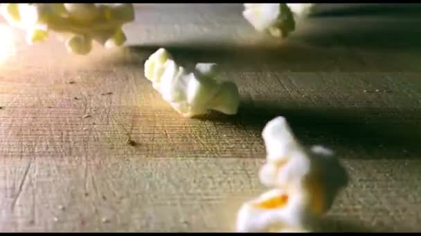 Close Popcorn Fall Wooden Desk Slow Motion — Stock Video